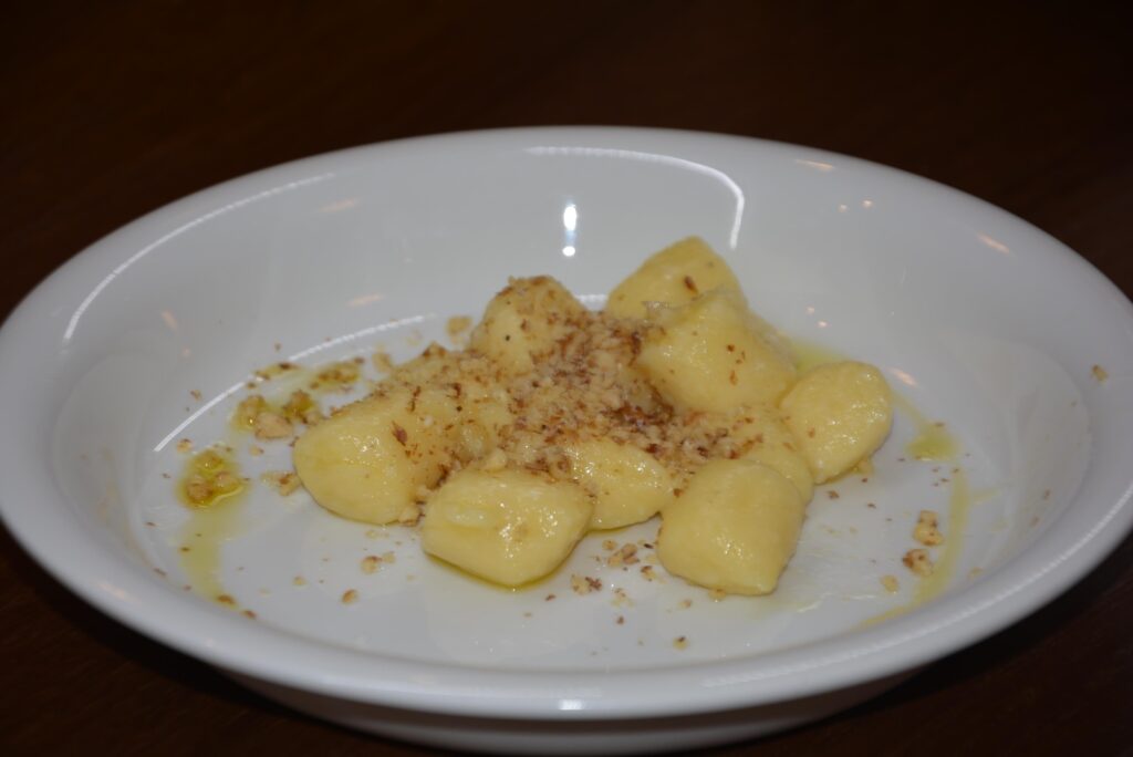 Potato gnocchi with truffle and walnuts